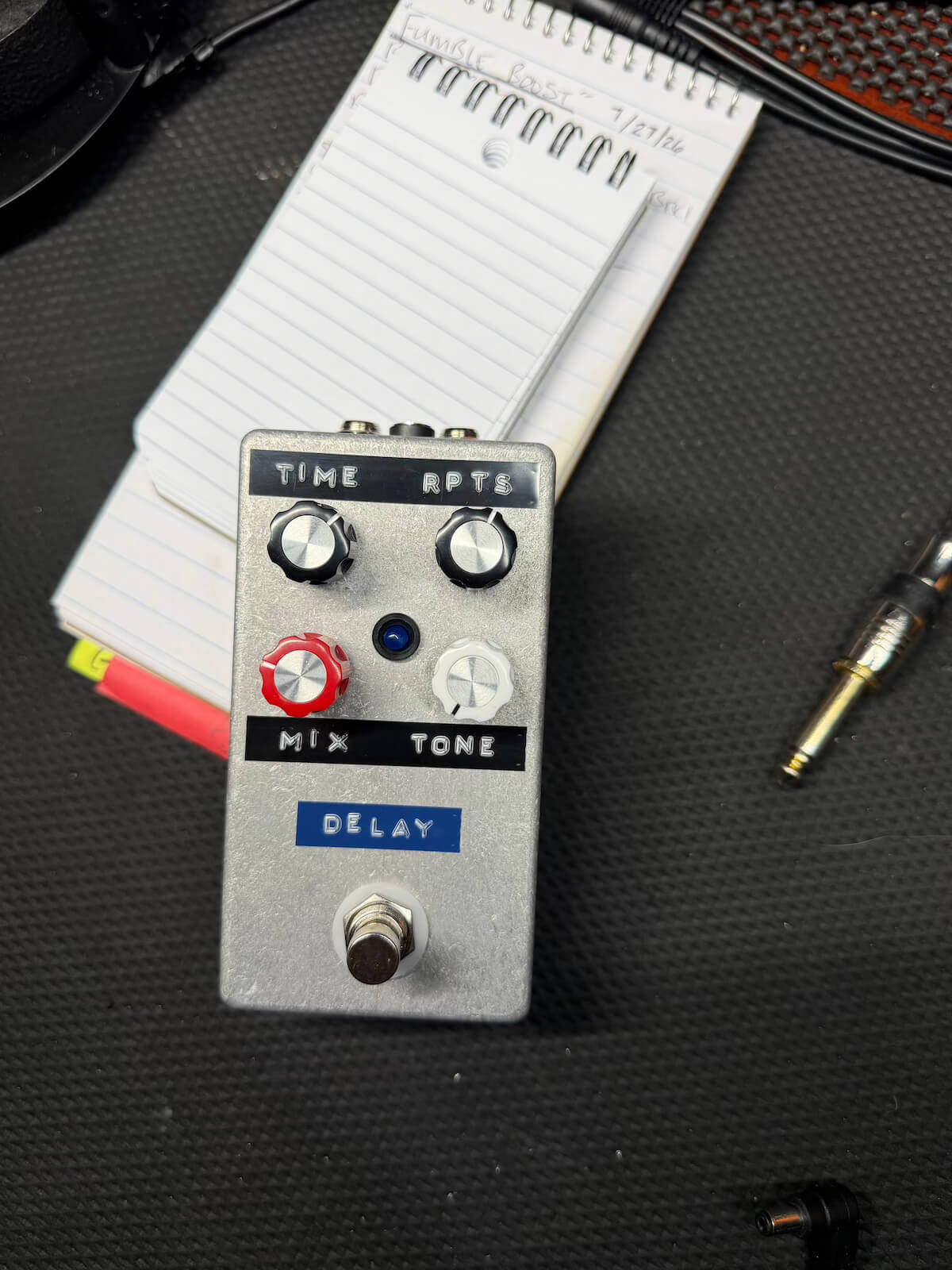 Finished silver delay pedal with Time Repeats Mix and Tone controls