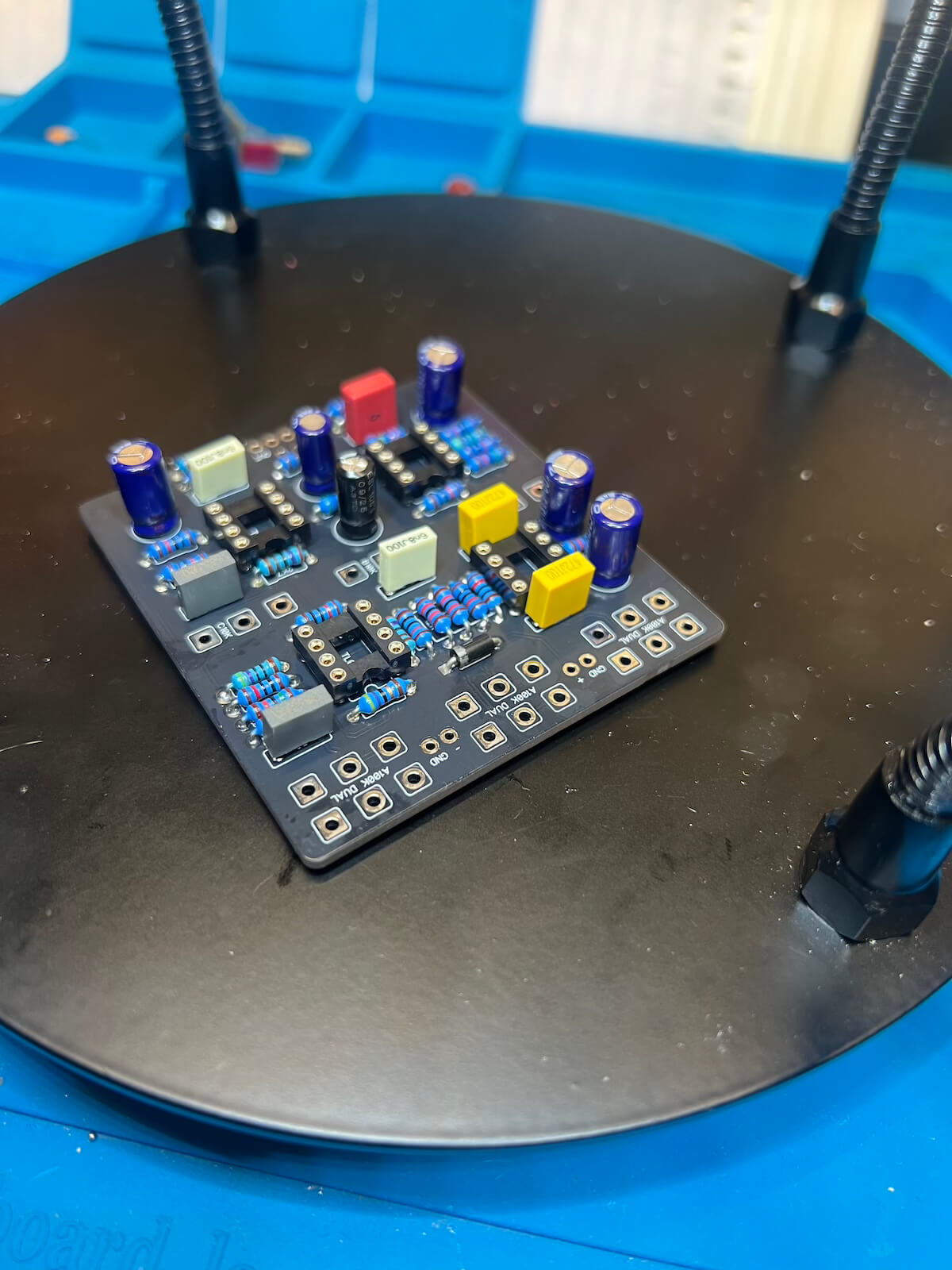 Populated pedal PCB on BJW Tech workbench