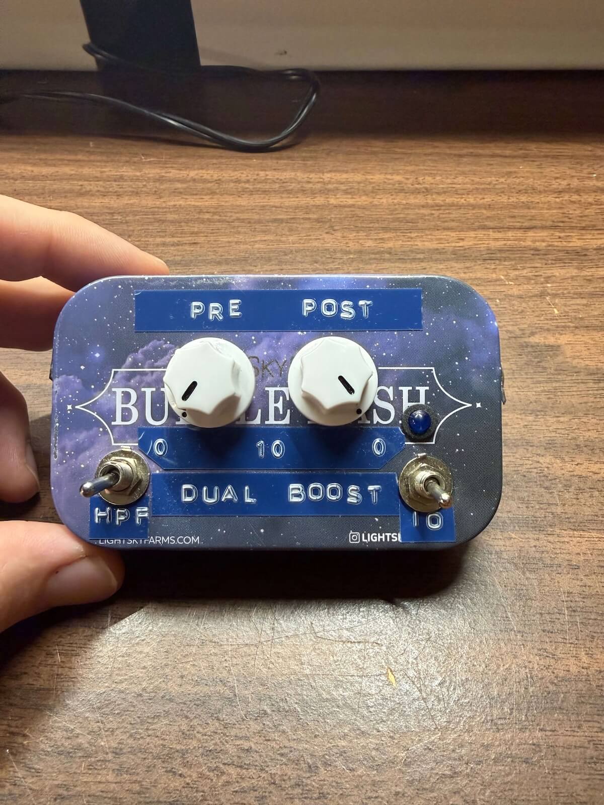 Finished dual-stage power boost pedal with embossed PRE POST HPF and DUAL BOOST labels