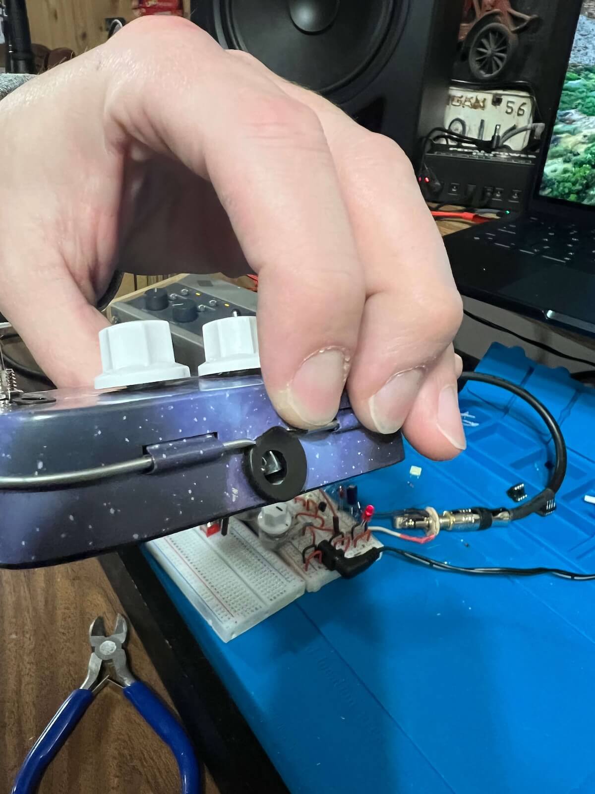 Side view of the dual-stage boost tin enclosure during final hardware assembly