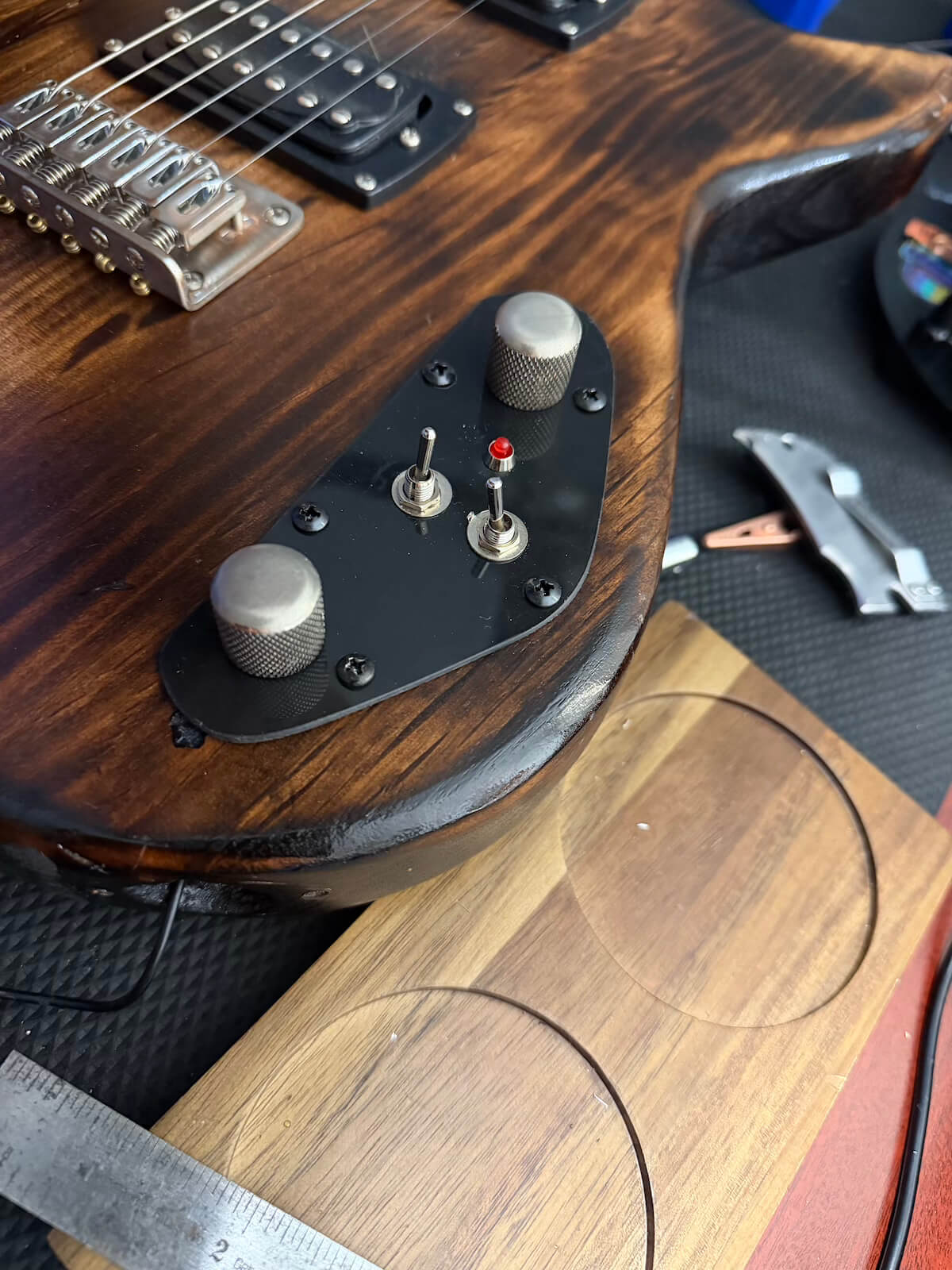 Finished custom control plate fitted to First Act guitar