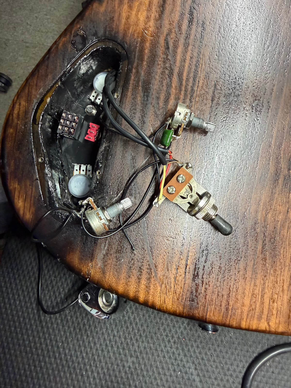 First Act guitar electronics and JFET preamp installed in rebuilt cavity