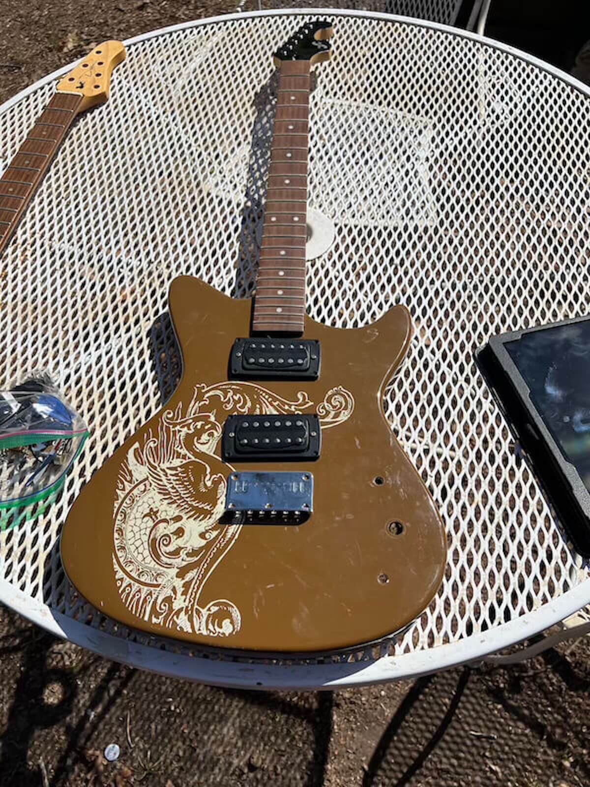 First Act ME4016 in its original brown finish with dragon graphic