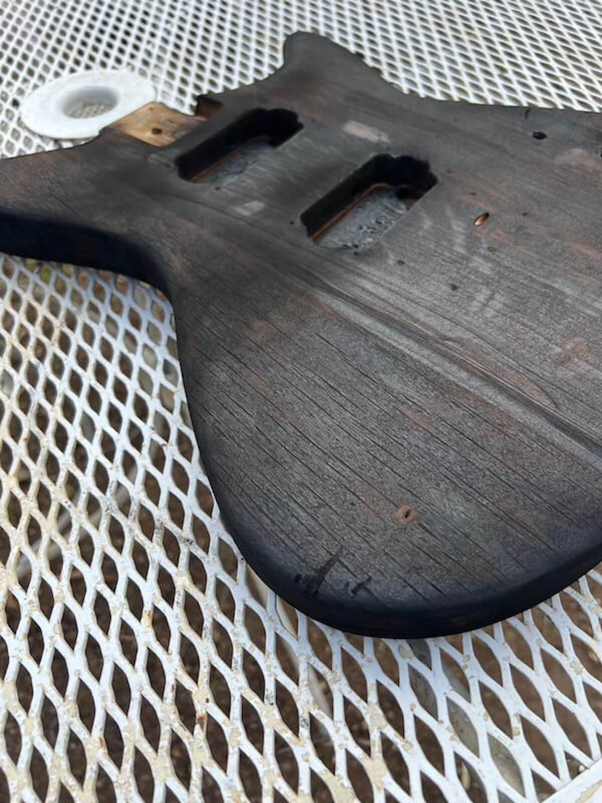 First Act guitar body after torch burning