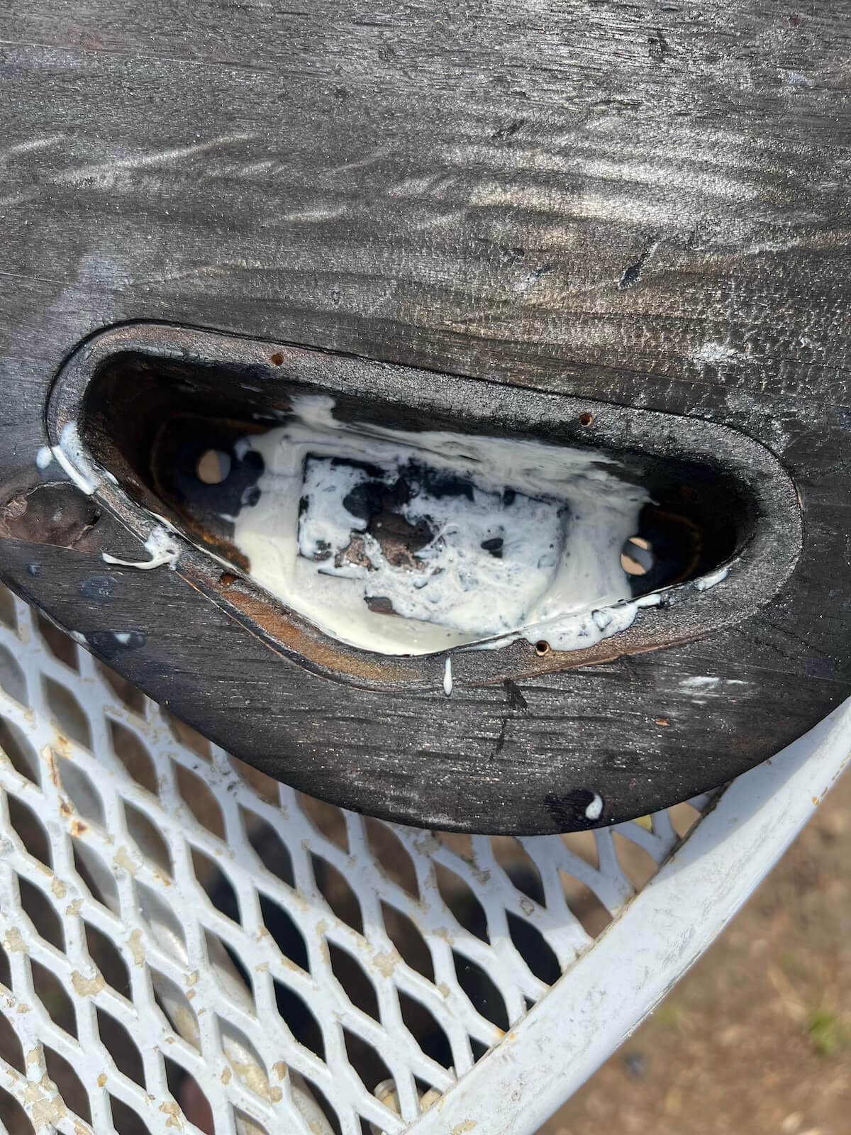Burned-through First Act control cavity with an early patch attempt