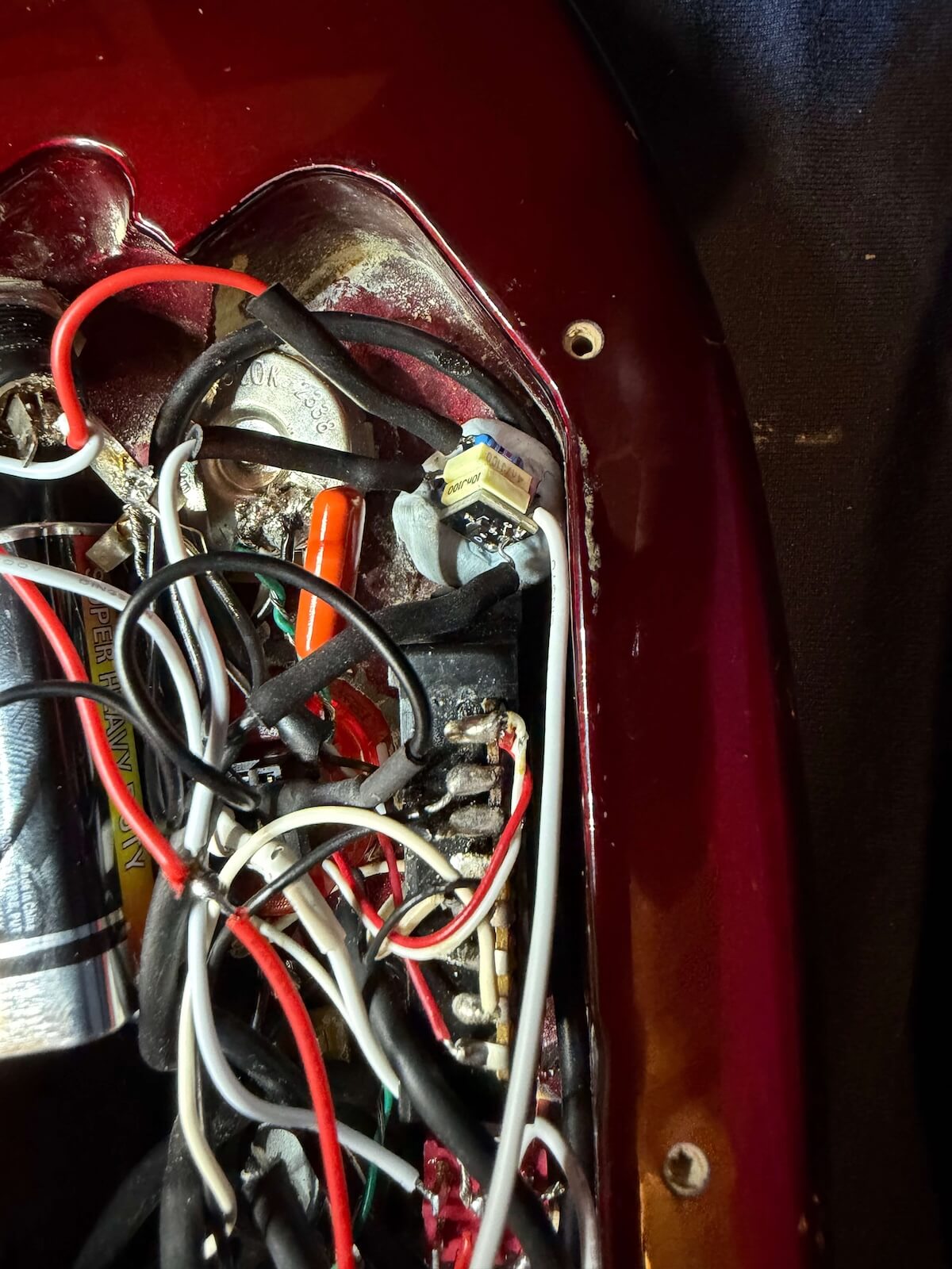 Jackson guitar electronics cavity during preamp installation