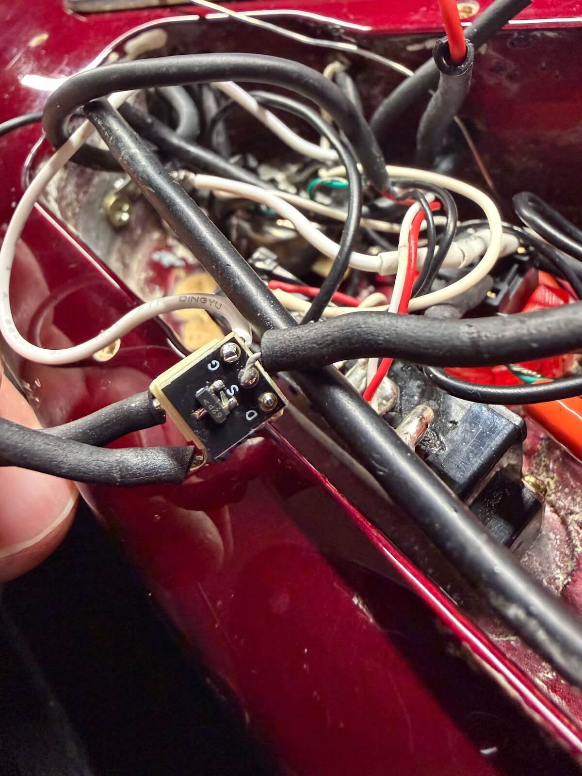 Completed compact JFET preamp board inside the guitar