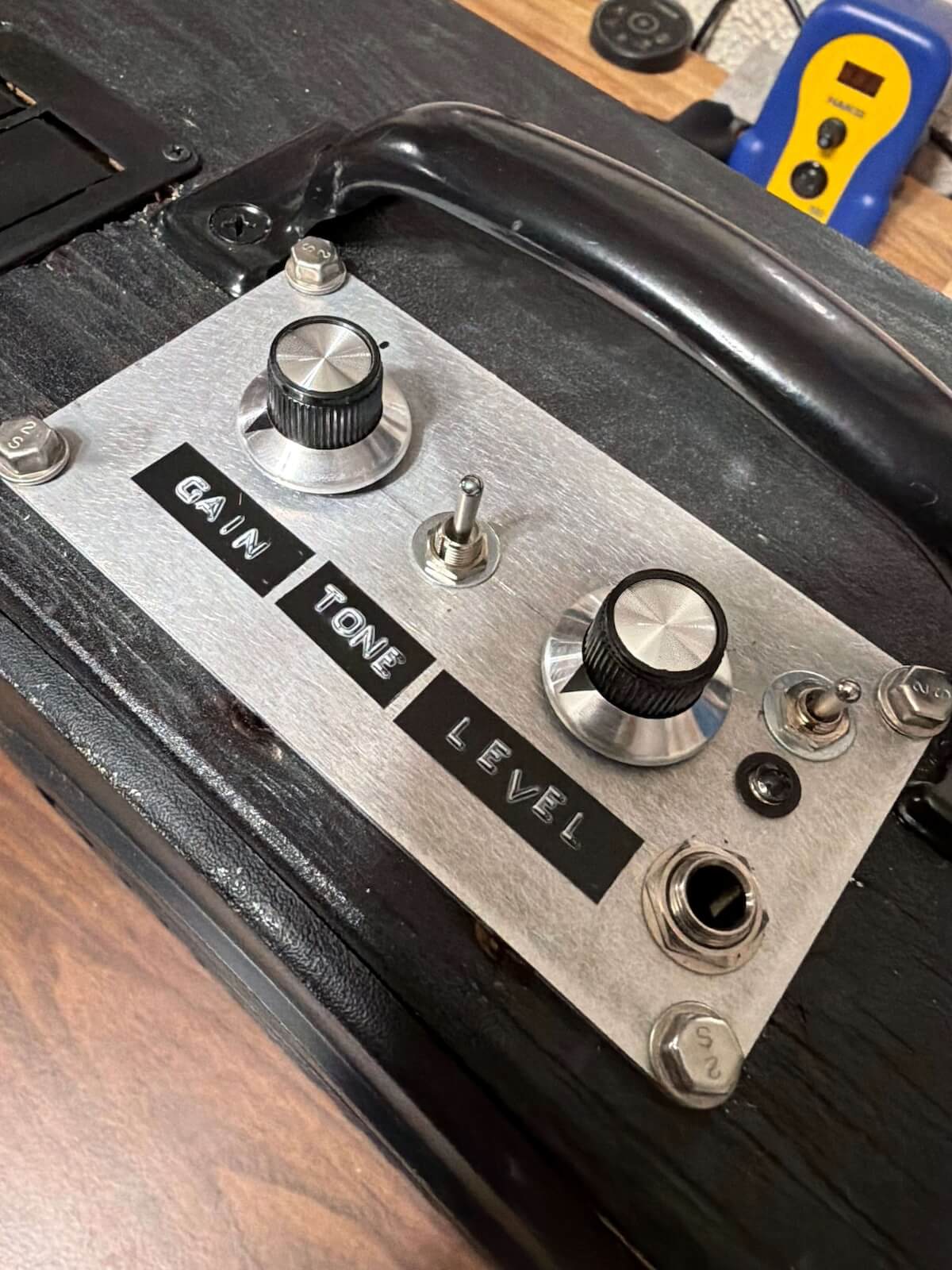 Finished LM386 practice amp showing Gain, Tone and Level controls