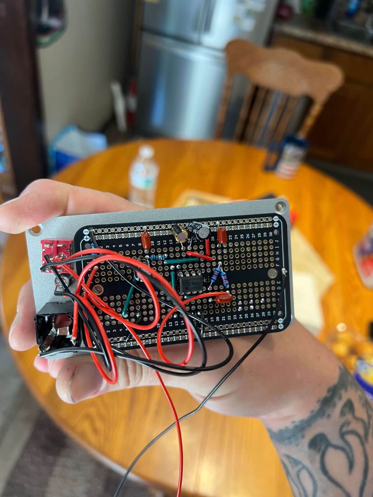 LM386 amplifier circuit transferred to permanent board behind the control panel