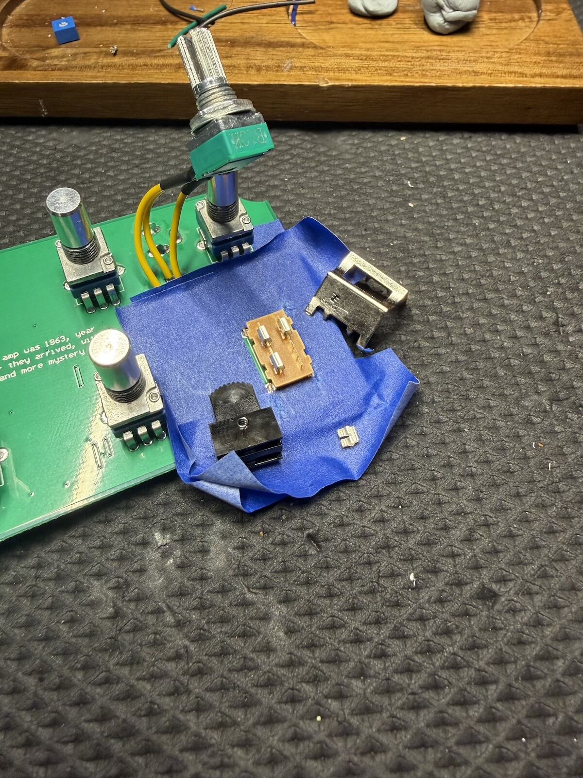 Original Notadumble channel selector partially dismantled while protecting the surrounding PCB