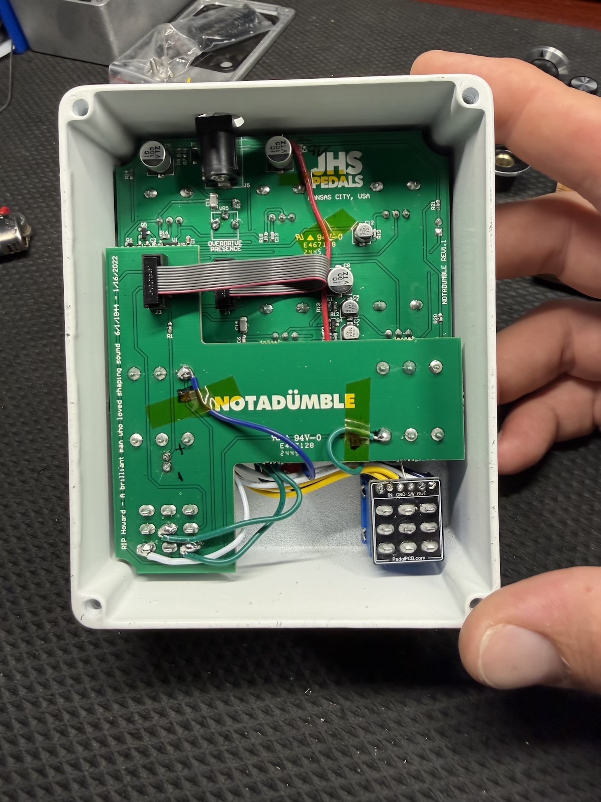 Notadumble wiring routed beneath and around the factory circuit boards